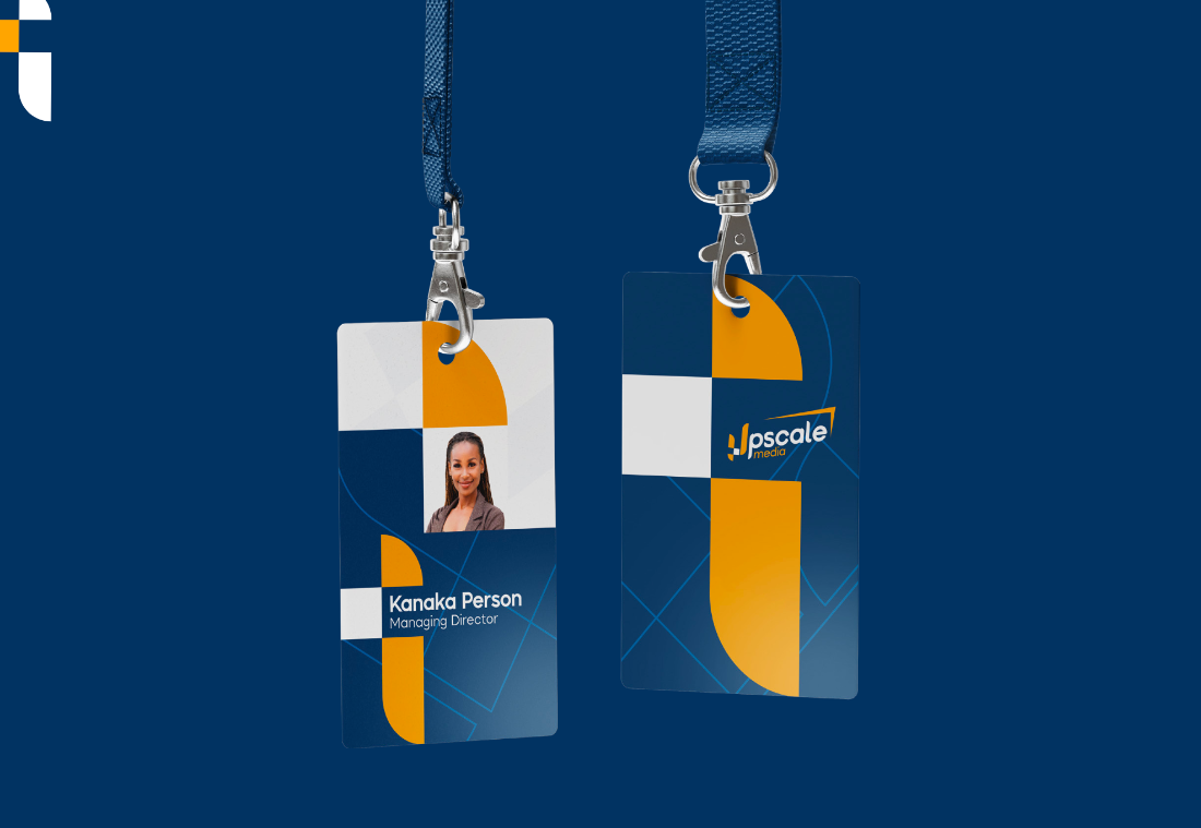 Upscale Media brand identity, lanyard ID cards in navy and gold